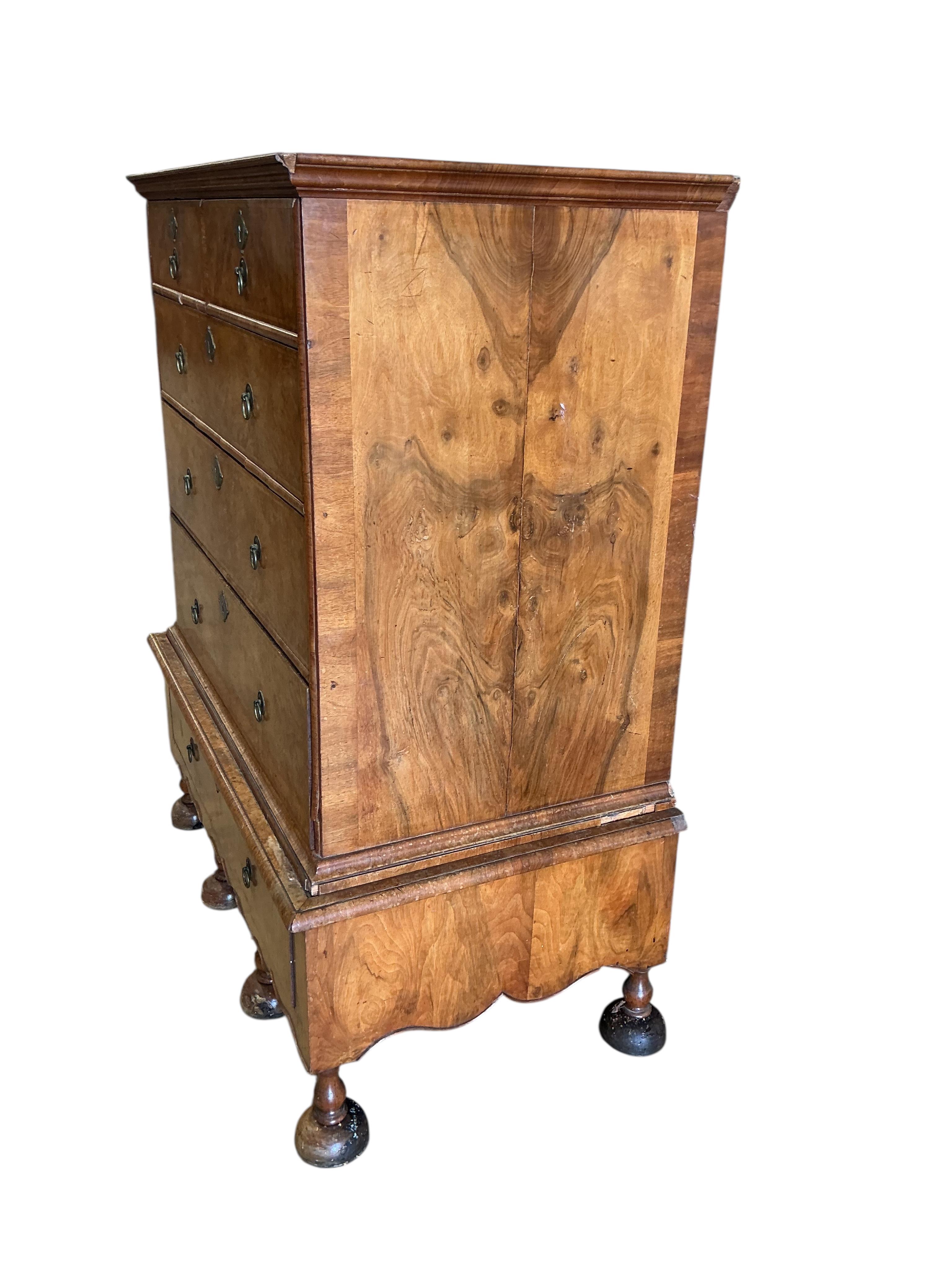An 18th century style walnut chest on stand, width 108cm, depth 62cm, height 132cm